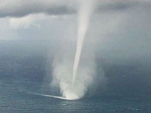 Notice the wake behind the Waterspout